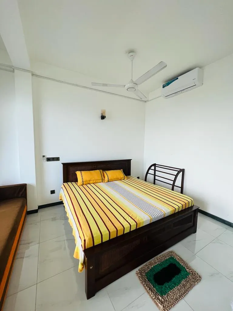 Bright air conditioned double room with wide sea facing windows