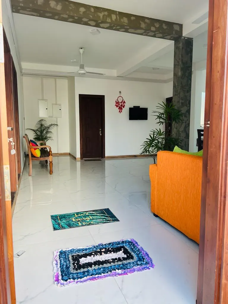 Shared guest lounge with a wall mounted television