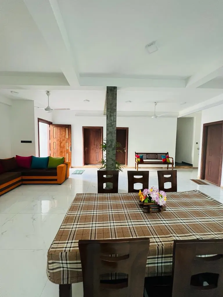 Shared dining table overlooking the common lounge