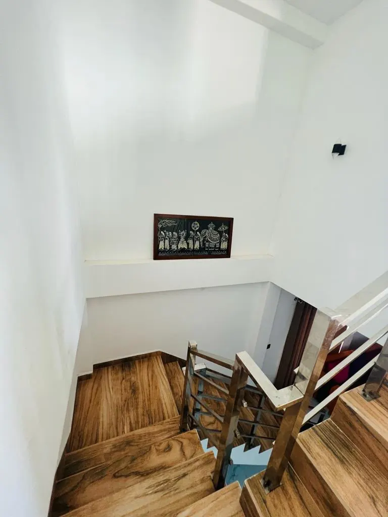 Wooden staircase leading to the upper floor
